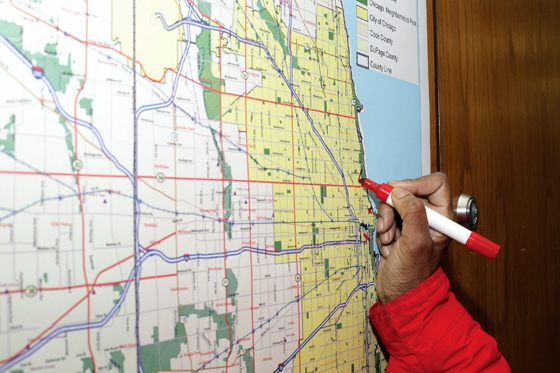 Drawing plans on a map of Chicago